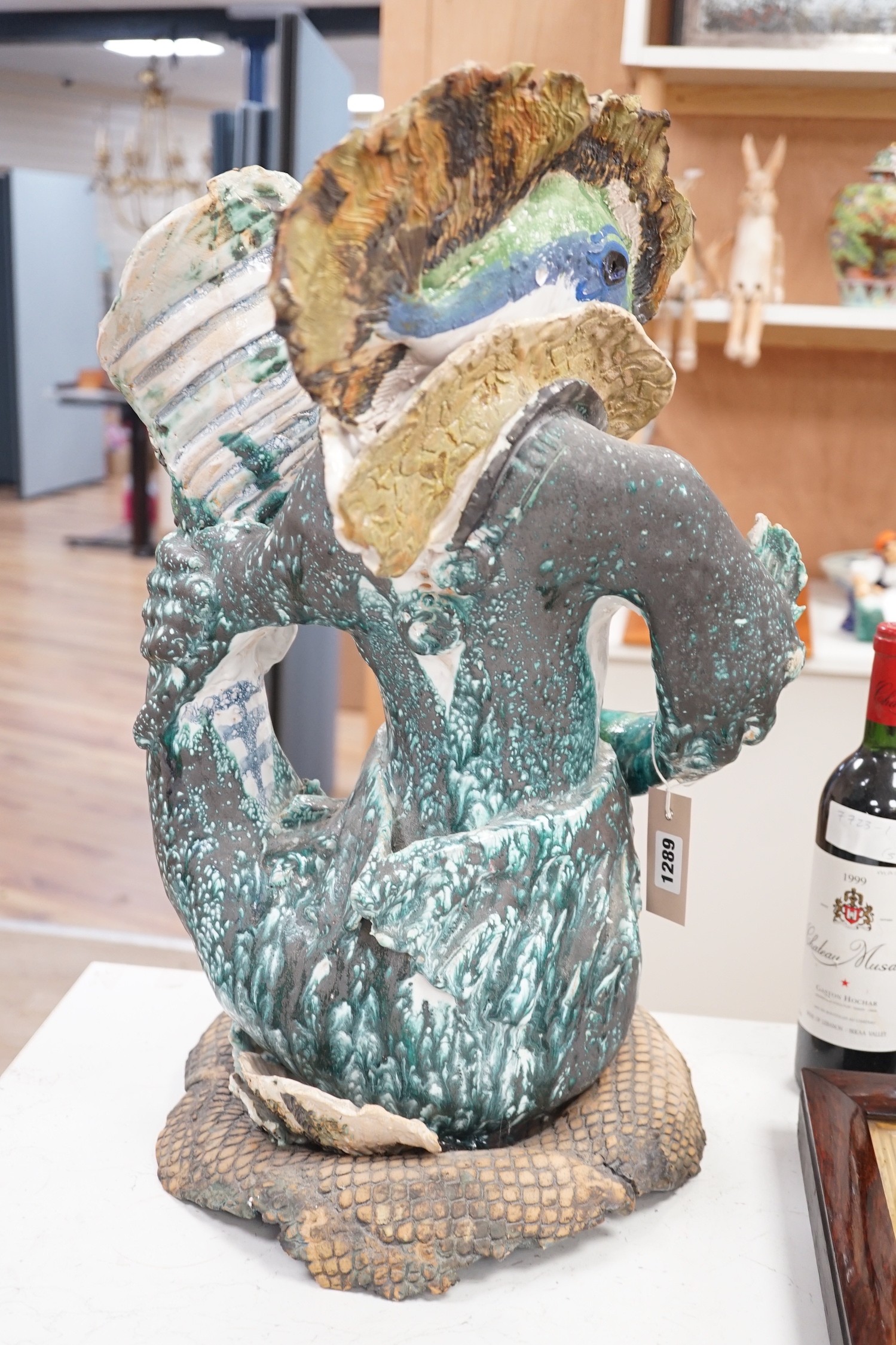 A large ceramic mer-creature sculpture, 58cm